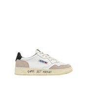 SCARPA MEDALIST LOW IN SUEDE E PELLE BIANCA E NERA CON LETTERING AUTRY