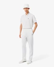 Polo dal taglio classico in jacquard con monogramma LACOSTE