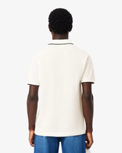 Polo classic fit L.12.12 con tasca e bordi a contrasto LACOSTE